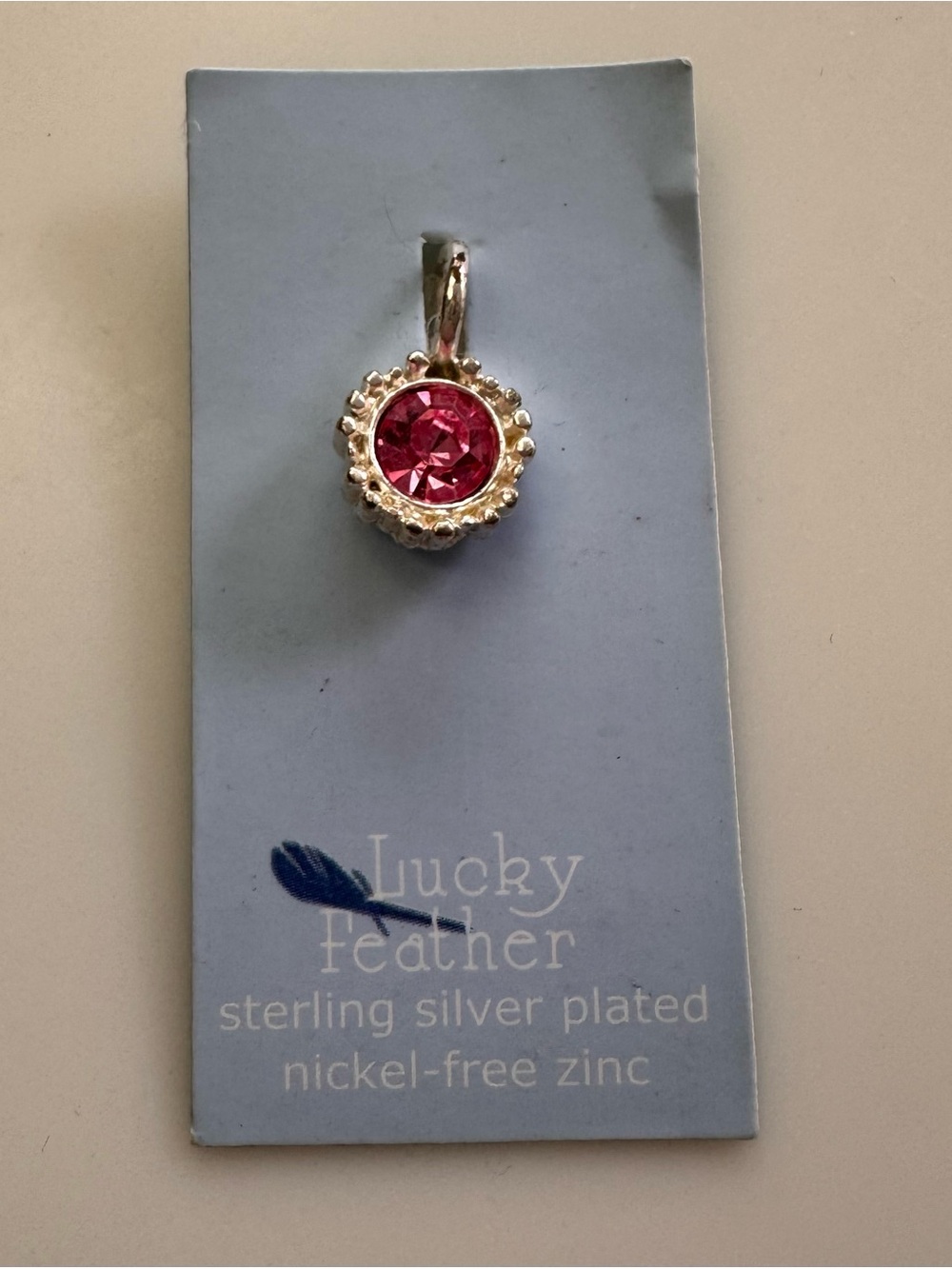 Lucky Feather Sterling Silver-Plated Pink Crystal Pendant